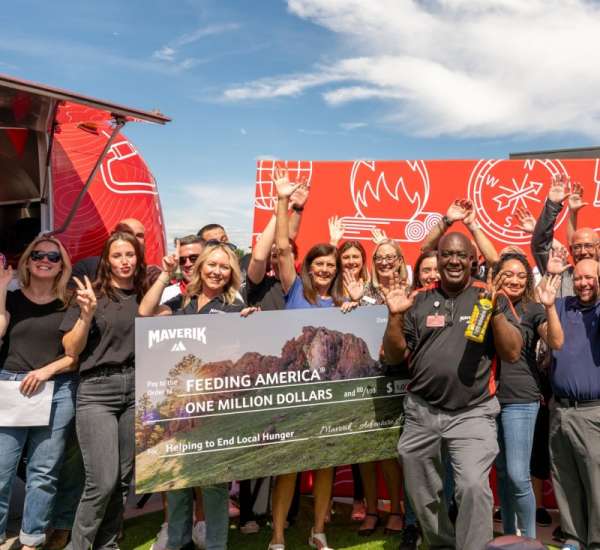 $1 m check maverik team and denver community